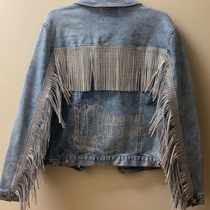 Jean jacket with fringe and design